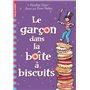 Le garçon dans la boîte à biscuits