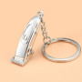 ARFUKA Porte-clés en métal avec pendentif tondeuse à cheveux pour homme, Argenté, Small