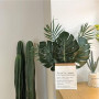 Lot de 20 feuilles de palmier artificielles de Monstera dorées avec tiges pour décoration de table de fête tropicale sur le thèm